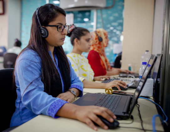 Women working in a computer