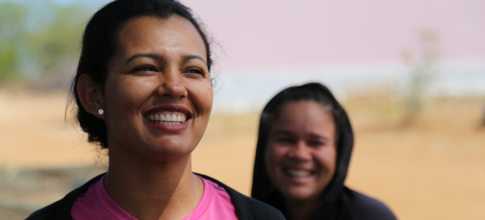 Two women smiling