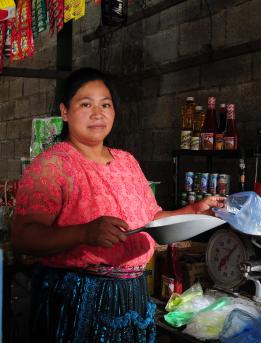 Woman working in her stall